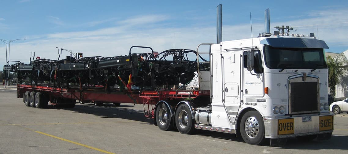 Pilot vehicle escorting an oversize load